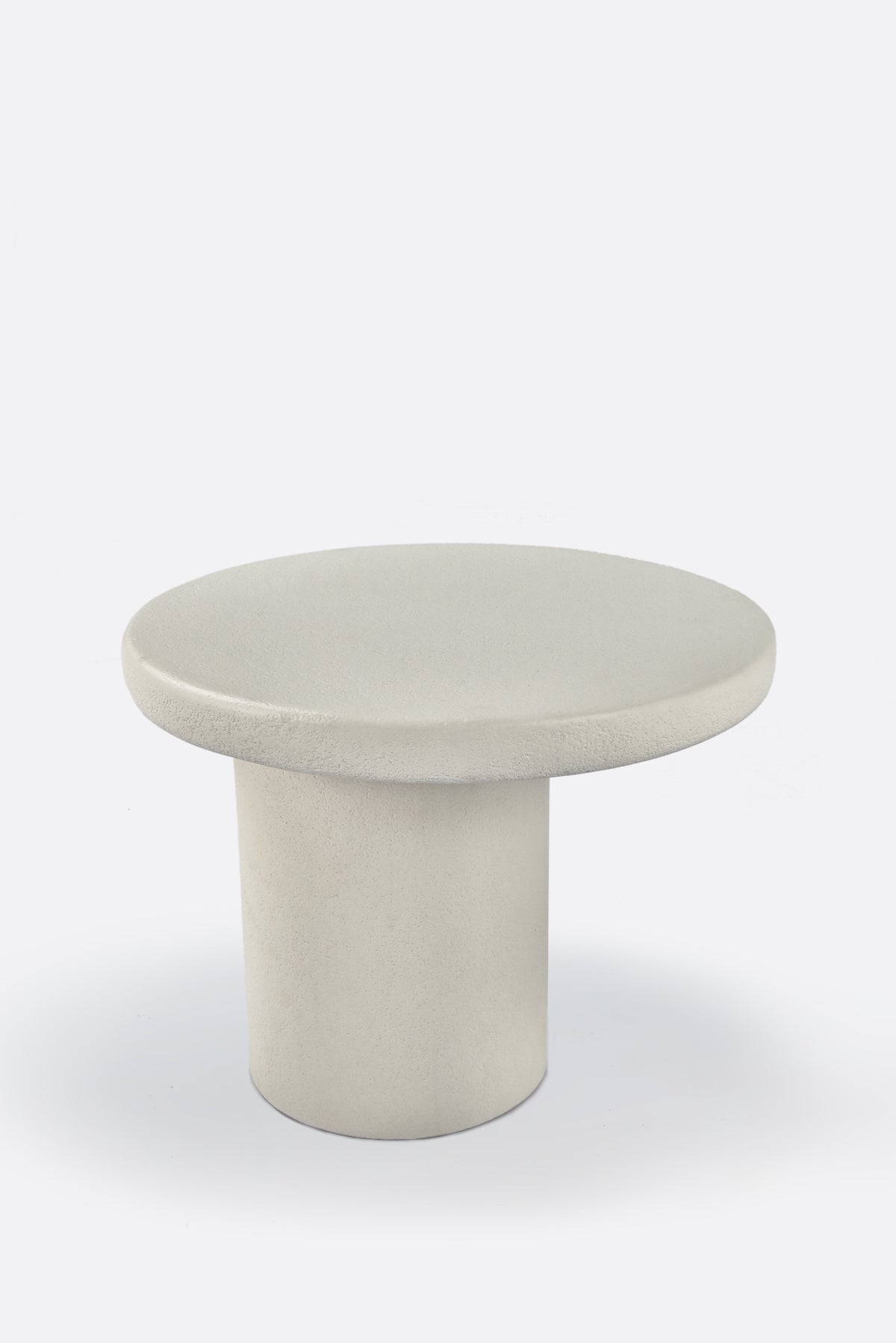 Mesa auxiliar de exterior de microcemento Claude