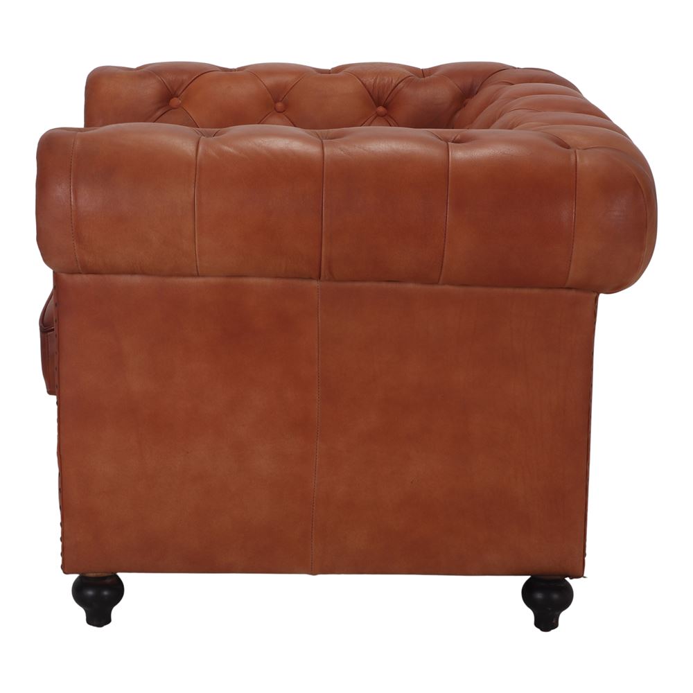 Sillón capitoné de piel Yolanda