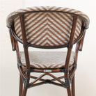 Silla con brazos de aluminio efecto ratán Young