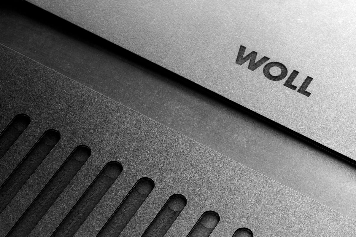 Tabla de cortar con asa y estrías Woll Cut & Serve 49 x 25 cm