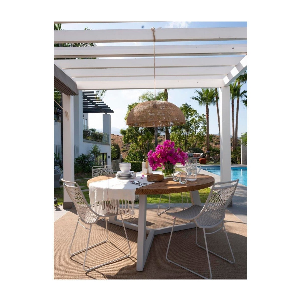 Silla de exterior de resina y metal gris piedra Sitia