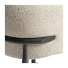 Silla tapizada beige claro de respaldo envolvente Tamariu