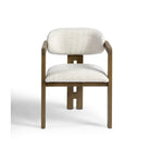 Sillón de comedor de madera y tapizado claro Benirràs