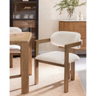 Sillón de comedor de madera y tapizado claro Benirràs