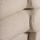 Cama de pino y bouclé Trebalúger