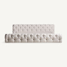 Cama tapizada beige Alcaufar