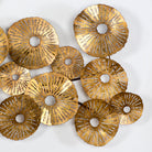 Escultura de metal dorado Lesbos