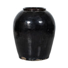 Tinaja antigua negra de barro cocido Tapia