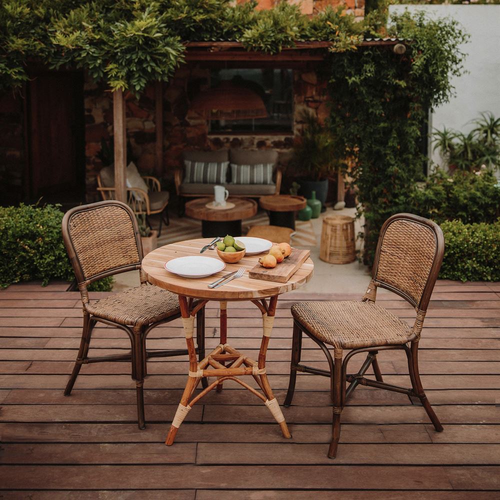 Mesa de comedor de ratán y teca Filipa