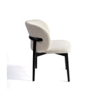 Sillón redondeado tapizado de madera negra Frontera