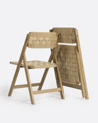 Silla plegable de teca y cuerda de papel Cora