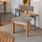 Silla tapizada de madera Ernesto