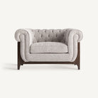Sillón amplio de fresno tapizado gris La Mola
