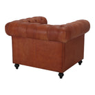 Sillón capitoné de piel Yolanda