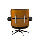 Sillón con reposapiés de piel Giussano