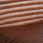 Sillón de cuero y hierro Peyia