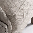 Sillón de respaldo alto de fresno y crema Aigües Blanques