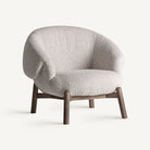 Sillón tapizado beige y olmo Es Caló