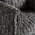 Sillón tapizado negro Es Cubells