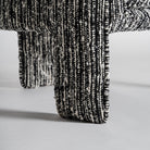 Sillón tapizado negro Es Cubells