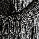 Sillón tapizado negro Es Cubells