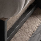Sofá capitoné de madera y poliéster Menton negro