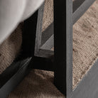 Sofá capitoné de madera y poliéster Menton negro