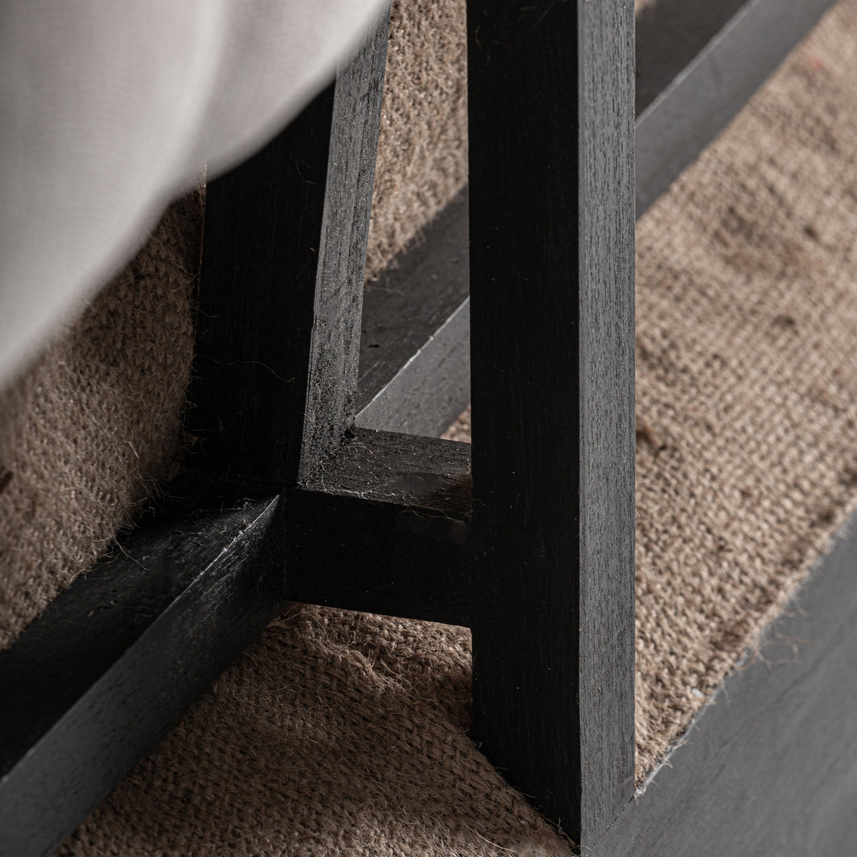 Sofá capitoné de madera y poliéster Menton negro